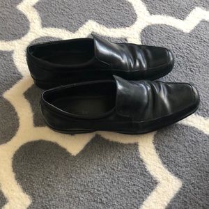 Calvin Klein black leather slip ons